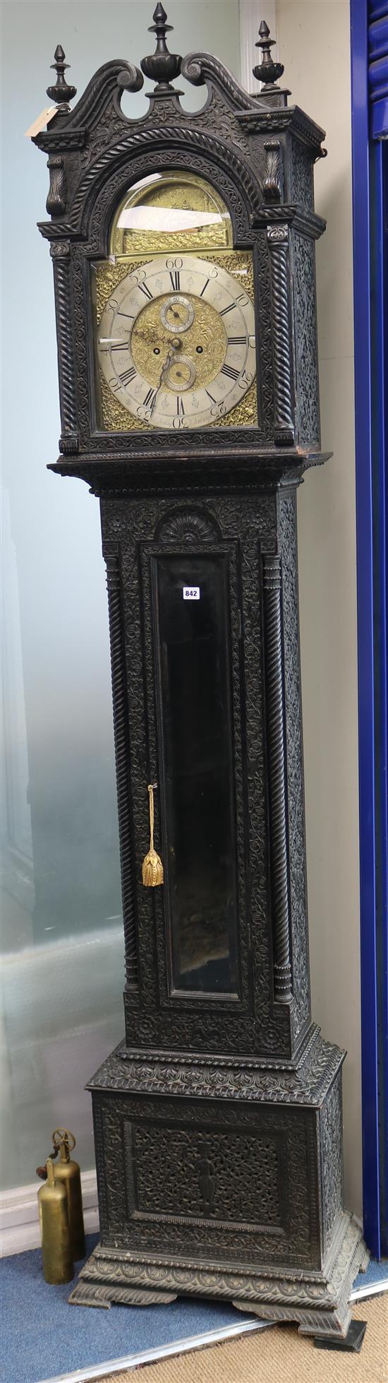 W. Young of Edinburgh. A carved mahogany Scottish eight day longcase clock, with arched brass dial, H.250cm